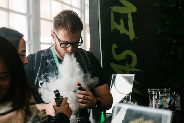 People vape at the Trade Show 'Vapevent' in Brooklyn earlier this year